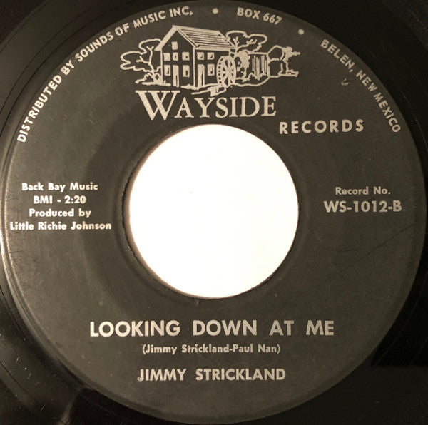 Jimmy Strickland : A World You Destroyed / Looking Down At Me (7", Single)