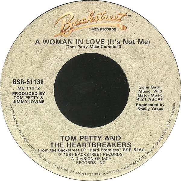 Tom Petty And The Heartbreakers : A Woman In Love (It's Not Me) (7", Single, Glo)