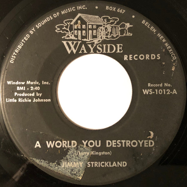 Jimmy Strickland : A World You Destroyed / Looking Down At Me (7", Single)