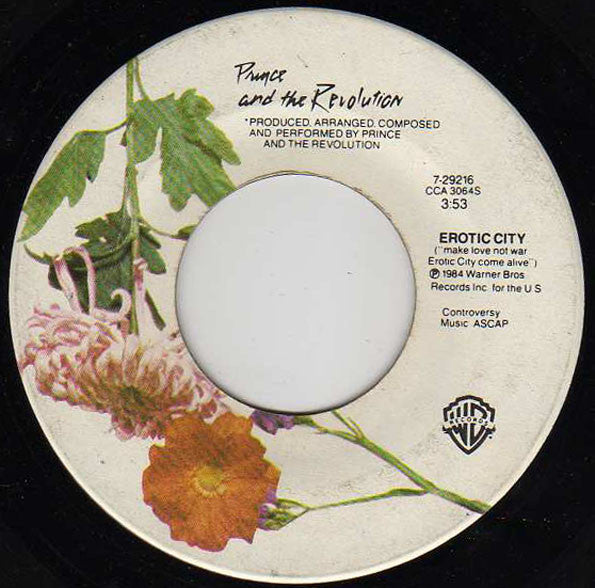 Prince And The Revolution : Let's Go Crazy / Erotic City (7", Single, Win)