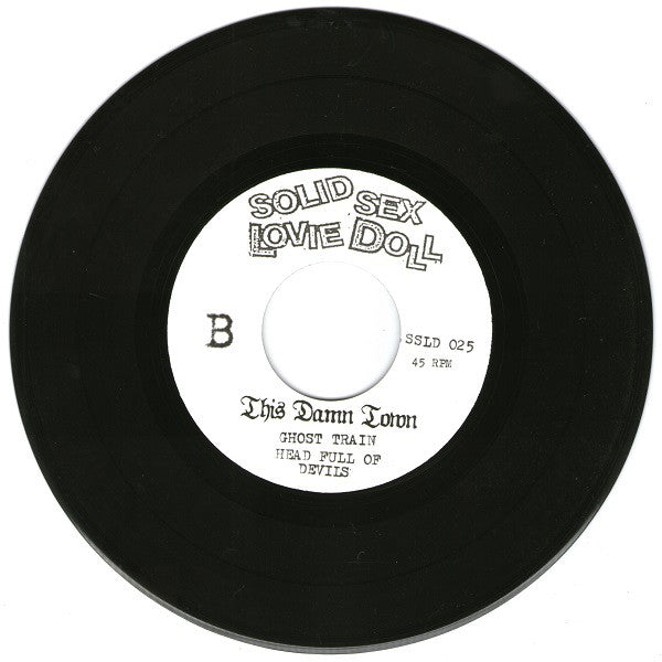 This Damn Town : Victim (7", Num)