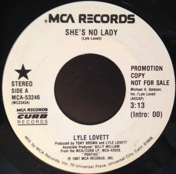 Lyle Lovett : She's No Lady (7", Single, Promo)